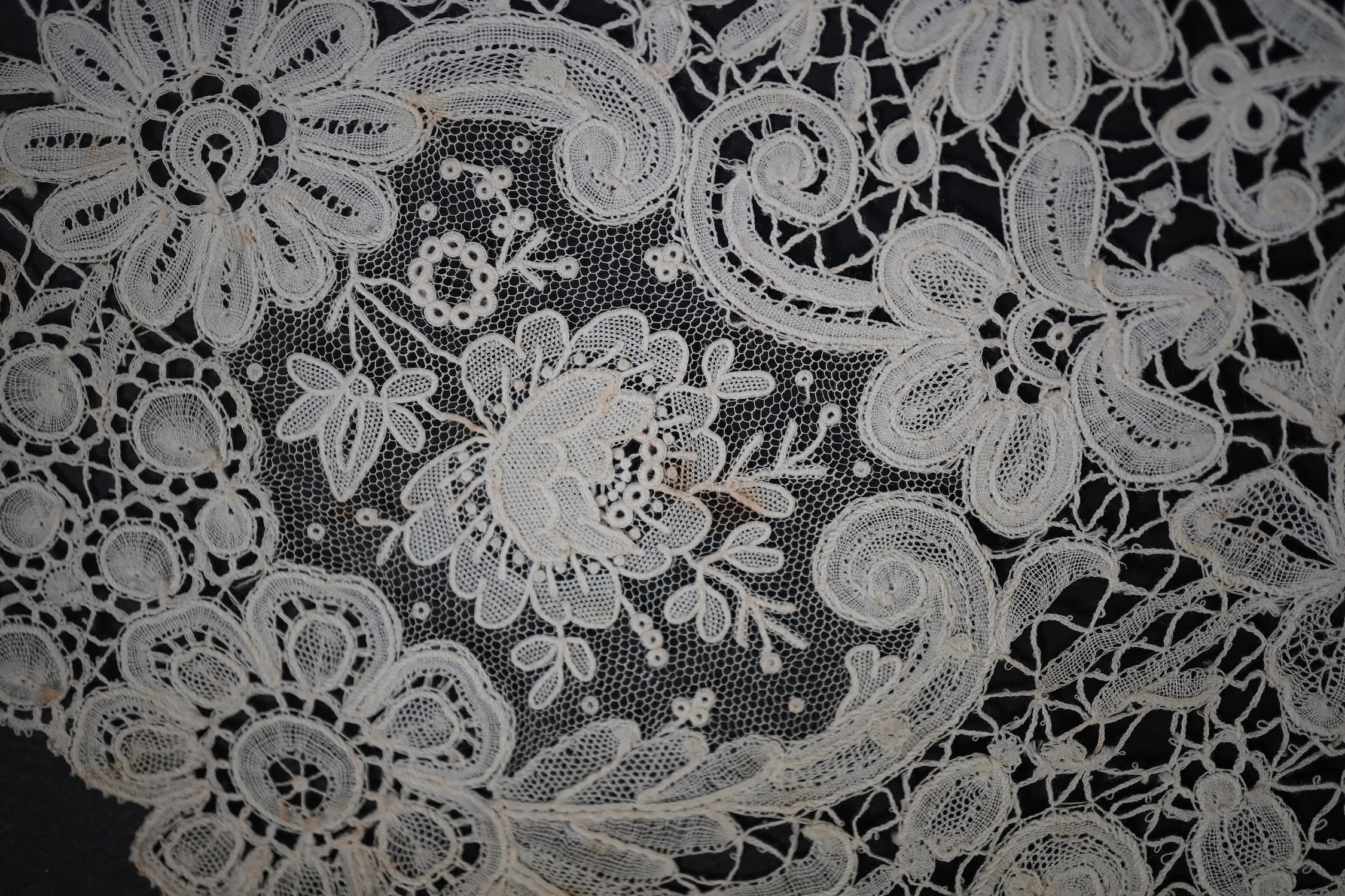 An 1860’s unused, large circular flounce shaped collar of mixed Brussels bobbin lace, with twelve needle lace Point de Gaz insertions, 18.5cm deep, approximately 248cm along bottom, edge. Condition - good